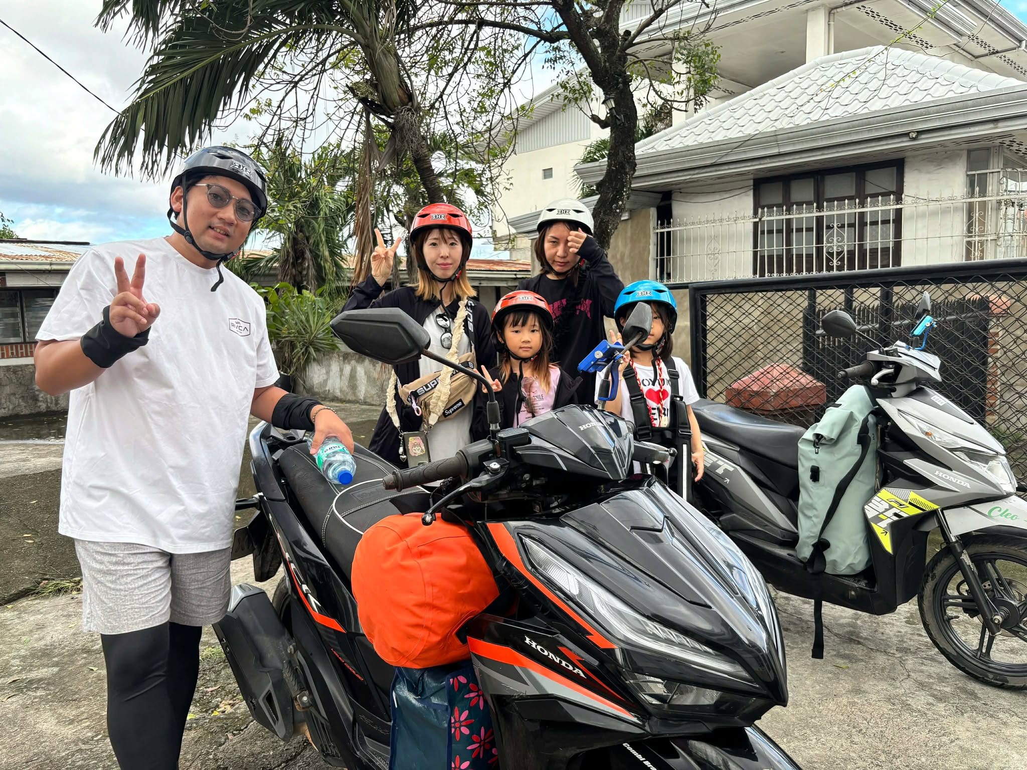 Happy Family renting our motorbike